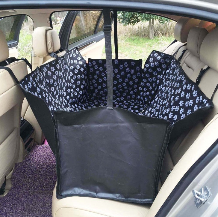 Pet car seat cover with floral pattern in a car